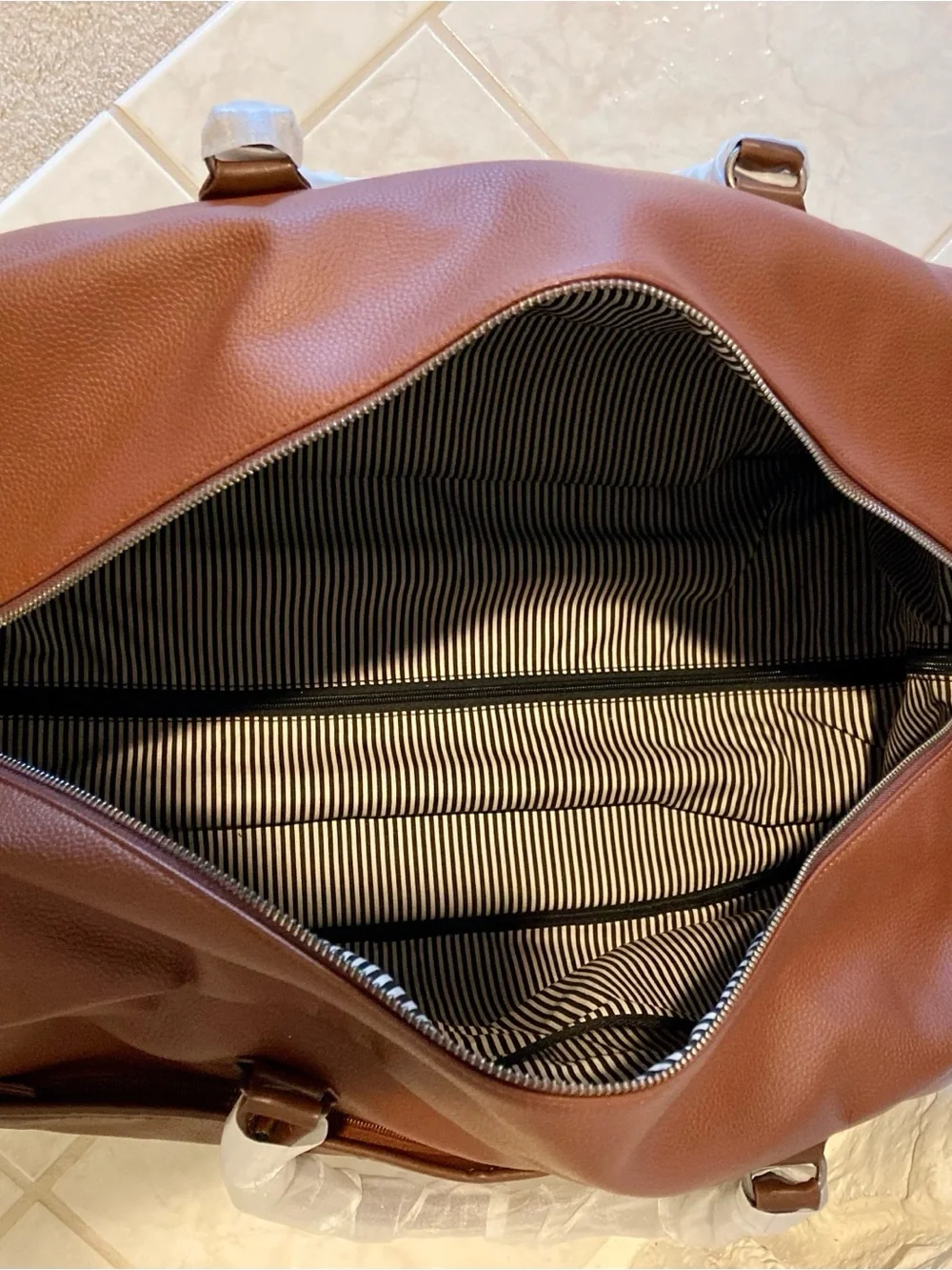NWOT Davidson rolling duffel bag by “Brouk” and Co.